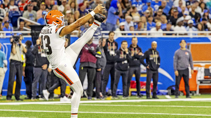 Sep 28, 2025; Detroit, Michigan, USA; Cleveland Browns punter Corey Bojorquez (13) kicks the ball during the second half against the Detroit Lions at Ford Field. Mandatory Credit: David Reginek-Imagn Images