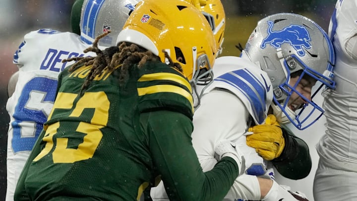 Detroit Lions QB Jared Goff (16) is sacked by Green Bay Packers defensive ends Rashan Gary (52) and Arron Mosby (53). Detroit Lions QB Jared Goff (16) is sacked by Green Bay Packers defensive ends Rashan Gary (52) and Arron Mosby (53).