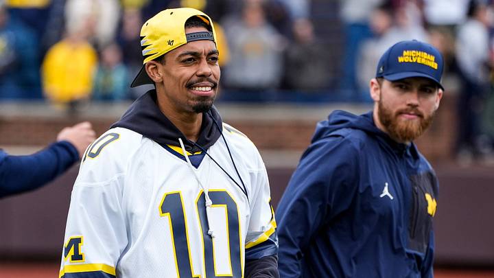Michigan wide receivers coach Micah Simon watches warm up during the spring game at Michigan Stadium in Ann Arbor on Saturday, April 18, 2026.