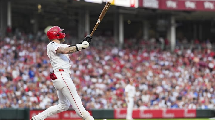 Jul 29, 2025; Cincinnati, Ohio, USA;  Cincinnati Reds outfielder Jake Fraley (27) watches his two-run home run against the Los Angeles Dodgers in the fourth inning at Great American Ball Park. Mandatory Credit: Aaron Doster-Imagn Images