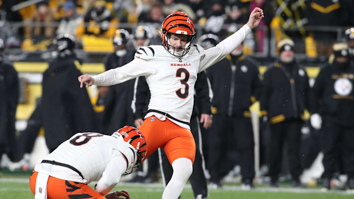 Jan 4, 2025; Pittsburgh, Pennsylvania, USA;  Cincinnati Bengals place kicker Cade York (3) kicks a field goal from the hold of punter Ryan Rehkow (8) against the Pittsburgh Steelers during the second quarter at Acrisure Stadium. Mandatory Credit: Charles LeClaire-Imagn Images
