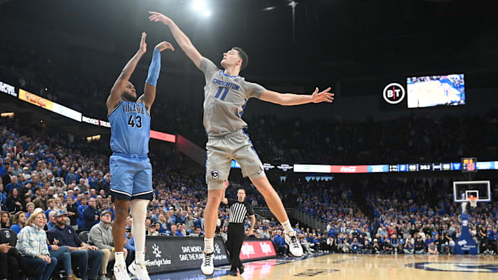 Dec 20, 2023; Omaha, Nebraska, USA;  Villanova Wildcats forward Eric Dixon (43) scores on a three