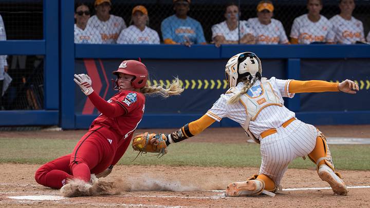 May 30, 2026; Oklahoma City, OK, USA; Texas Tech Red Raiders third baseman Taylor Pannell (6) slides safe past the tag by Tennessee Lady Volunteers catcher Elsa Morrison (22) in the seventh inning during the NCAA Women’s College World Series at Devon Park. Mandatory Credit: Brett Rojo-Imagn Images May 30, 2026; Oklahoma City, OK, USA; Texas Tech Red Raiders third baseman Taylor Pannell (6) slides safe past the tag by Tennessee Lady Volunteers catcher Elsa Morrison (22) in the seventh inning during the NCAA Women’s College World Series at Devon Park. Mandatory Credit: Brett Rojo-Imagn Images