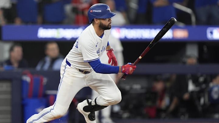 Oct 20, 2025; Toronto, Ontario, CAN; Toronto Blue Jays shortstop Isiah Kiner-Falefa (7) hits a single against the Seattle Mariners in the seventh inning during game seven of the ALCS round for the 2025 MLB playoffs at Rogers Centre. Mandatory Credit: John E. Sokolowski-Imagn Images