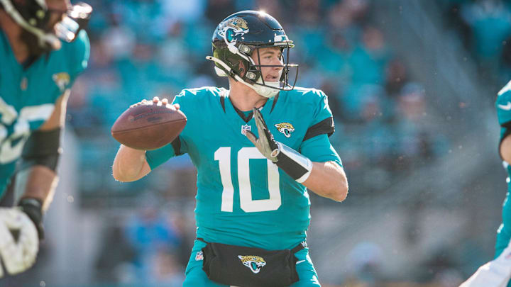 Dec 1, 2024; Jacksonville, Florida, USA; Jacksonville Jaguars quarterback Mac Jones (10) throws the ball against the Houston Texans in the second quarter at EverBank Stadium. Mandatory Credit: Jeremy Reper-Imagn Images