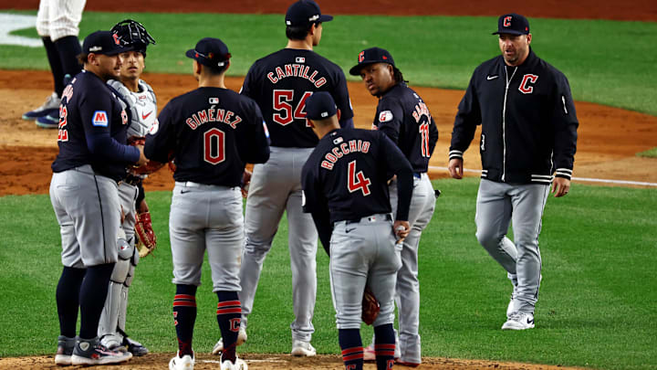 Oct 14, 2024; Bronx, New York, USA; Cleveland Guardians manger Stephen Vogt walks to the mound to to relieve pitcher Joey Cantillo (54) during the fourth inning against the New York Yankees in game one of the ALCS for the 2024 MLB Playoffs at Yankee Stadium. Mandatory Credit: Vincent Carchietta-Imagn Images