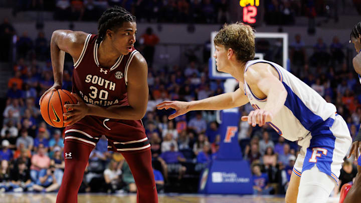 Feb 15, 2025; Gainesville, Florida, USA; South Carolina Gamecocks forward Collin Murray-Boyles (30) posts up against Florida Gators forward Thomas Haugh (10) during the first half at Exactech Arena at the Stephen C. O'Connell Center. Feb 15, 2025; Gainesville, Florida, USA; South Carolina Gamecocks forward Collin Murray-Boyles (30) posts up against Florida Gators forward Thomas Haugh (10) during the first half at Exactech Arena at the Stephen C. O'Connell Center.