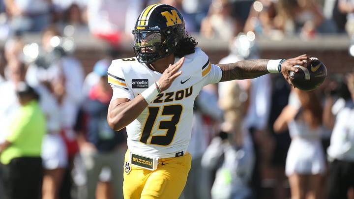 Oct 17, 2026; Oxford, Mississippi, USA;  Missouri Tigers quarterback Austin Simmons (13) throws a pass during the first quarter against the Mississippi Rebels at Vaught-Hemingway Stadium.  Mandatory Credit: Petre Thomas-Imagn Images