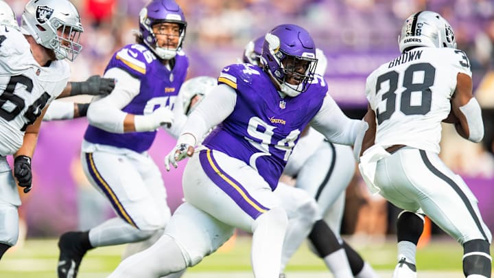 Minnesota Vikings defensive tackle Taki Taimani (94) looks to tackle Las Vegas Raiders running back Brittain Brown during a preseason game on Aug. 10, 2024, at U.S. Bank Stadium in Minneapolis. 