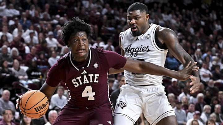 Mississippi State Bulldogs forward Brandon Walker (4) looks to pass the ball as Texas A&M Aggies forward Rashaun Agee (12) defends during the second half at Reed Arena. Mississippi State Bulldogs forward Brandon Walker (4) looks to pass the ball as Texas A&M Aggies forward Rashaun Agee (12) defends during the second half at Reed Arena.