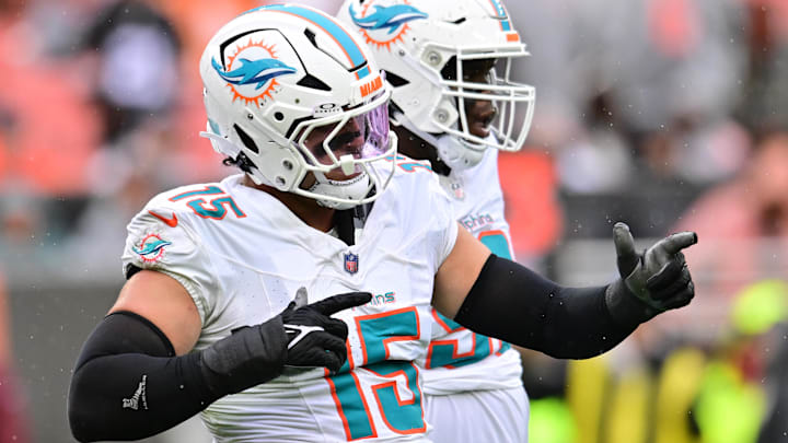 Oct 19, 2025; Cleveland, Ohio, USA; Miami Dolphins linebacker Jaelan Phillips (15) celebrates after a tackle during the first half against the Cleveland Browns at Huntington Bank Field. Mandatory Credit: Ken Blaze-Imagn Images