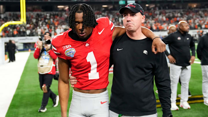 Ohio State Buckeyes cornerback Davison Igbinosun (1) leaves the field following the Cotton Bowl in Arlington, Texas for the College Football Playoff quarterfinal game against the Miami Hurricanes on Dec. 31, 2025. Ohio State lost 24-14.
