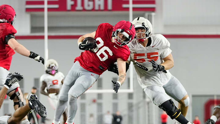 Ohio State Buckeyes tight end Mason Williams (86) spins around defensive tackle John Walker (55) during Student Appreciation Day spring practice at the Woody Hayes Athletic Center on April 4, 2026.