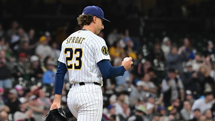 Mar 29, 2026; Milwaukee, Wisconsin, USA; Milwaukee Brewers starting pitcher Brandon Sproat (23) reacts after giving up a solo home run against the Chicago White Sox in the third inning at American Family Field. Mandatory Credit: Benny Sieu-Imagn Images