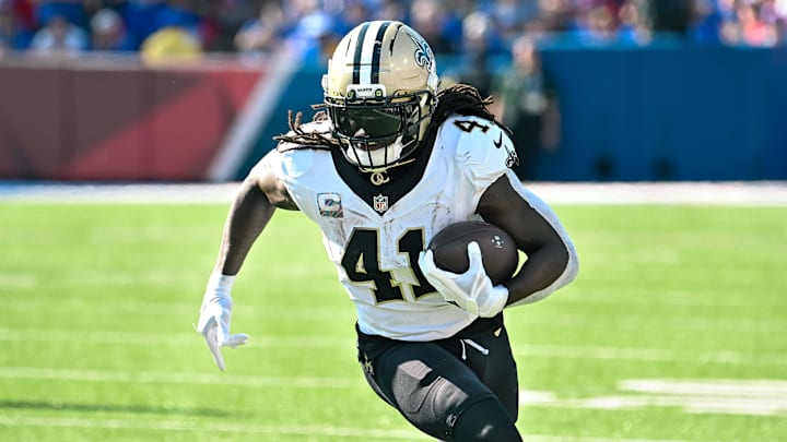 Sep 28, 2025; Orchard Park, New York, USA; New Orleans Saints running back Alvin Kamara (41) carries the ball against the Buffalo Bills in the third quarter at Highmark Stadium. Mandatory Credit: Mark Konezny-Imagn Images