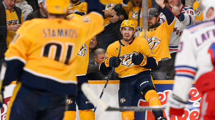 Dec 17, 2024; Nashville, Tennessee, USA;  Nashville Predators defenseman Adam Wilsby (83) celebrates his goal against the New York Rangers during the third period at Bridgestone Arena. Mandatory Credit: Steve Roberts-Imagn Images