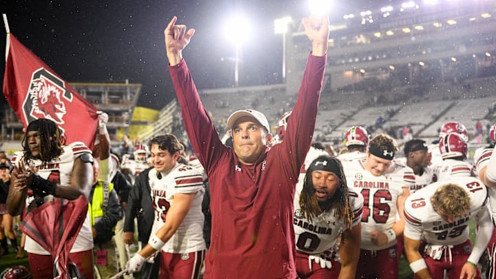 Nov 9, 2024; Nashville, Tennessee, USA;  South Carolina Gamecocks head coach Shane Beamer and his team celebrate the win with their fans against the Vanderbilt Commodores during the second half at FirstBank Stadium. Mandatory Credit: Steve Roberts-Imagn Images