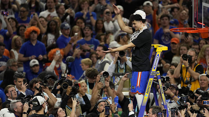 Apr 7, 2025; San Antonio, TX, USA; Florida Gators guard Walter Clayton Jr. (1) cuts the net after defeating the Houston Cougars in the national championship game of the Final Four of the 2025 NCAA Tournament at the Alamodome. Apr 7, 2025; San Antonio, TX, USA; Florida Gators guard Walter Clayton Jr. (1) cuts the net after defeating the Houston Cougars in the national championship game of the Final Four of the 2025 NCAA Tournament at the Alamodome.