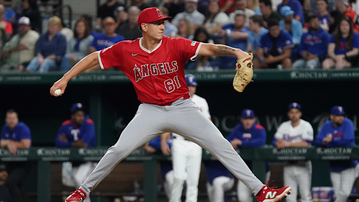 Apr 16, 2025; Arlington, Texas, USA; Los Angeles Angels relief pitcher Michael Darrell-Hicks (61) throws to the plate during the eighth inning against the Texas Rangers at Globe Life Field. Mandatory Credit: Raymond Carlin III-Imagn Images