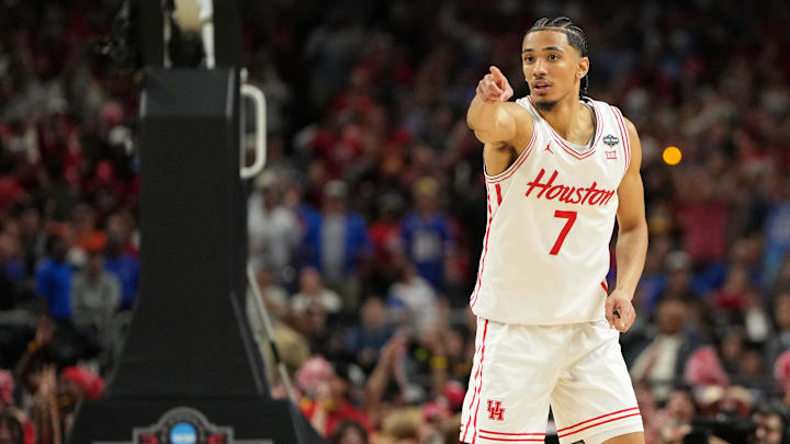 Apr 7, 2025; San Antonio, TX, USA; Houston Cougars guard Milos Uzan (7) reacts after a play against the Florida Gators during the first half of the national championship game of the Final Four of the 2025 NCAA Tournament at the Alamodome. Apr 7, 2025; San Antonio, TX, USA; Houston Cougars guard Milos Uzan (7) reacts after a play against the Florida Gators during the first half of the national championship game of the Final Four of the 2025 NCAA Tournament at the Alamodome.