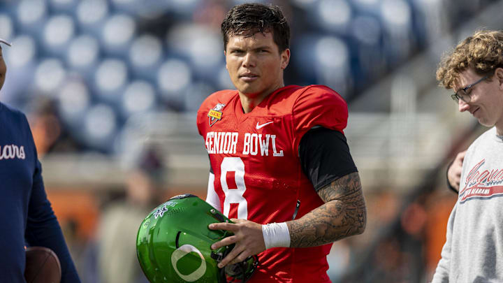 Jan 28, 2025; Mobile, AL, USA; National team quarterback Dillon Gabriel of Oregon (8) pauses after practice during Senior Bowl practice for the National team at Hancock Whitney Stadium. Mandatory Credit: Vasha Hunt-Imagn Images