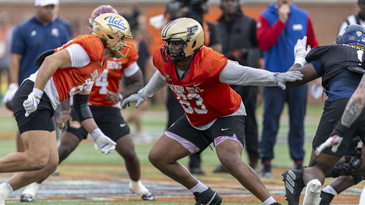Jan 30, 2025; Mobile, AL, USA; National team offensive lineman Marcus Mbow of Purdue (63) works through drills during Senior Bowl practice for the National team at Hancock Whitney Stadium. Mandatory Credit: Vasha Hunt-Imagn Images