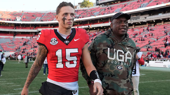 Georgia quarterback Carson Beck leaves the field after a win over Massachusetts on Nov. 23.