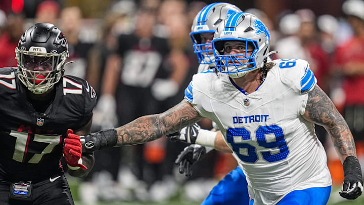 Aug 8, 2025; Atlanta, Georgia, USA; Detroit Lions guard Tate Ratledge (69) blocks Atlanta Falcons linebacker Arnold Ebiketie (17) during the second quarter at Mercedes-Benz Stadium. Mandatory Credit: Dale Zanine-Imagn Images Aug 8, 2025; Atlanta, Georgia, USA; Detroit Lions guard Tate Ratledge (69) blocks Atlanta Falcons linebacker Arnold Ebiketie (17) during the second quarter at Mercedes-Benz Stadium. Mandatory Credit: Dale Zanine-Imagn Images