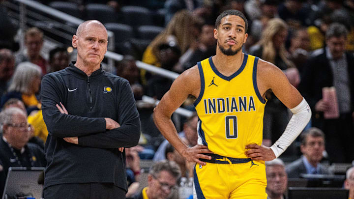 Oct 30, 2023; Indianapolis, Indiana, USA; Indiana Pacers head coach Rick Carlisle and guard Tyrese Haliburton (0) look on in the second half against the Chicago Bulls at Gainbridge Fieldhouse. Mandatory Credit: Trevor Ruszkowski-USA TODAY Sports