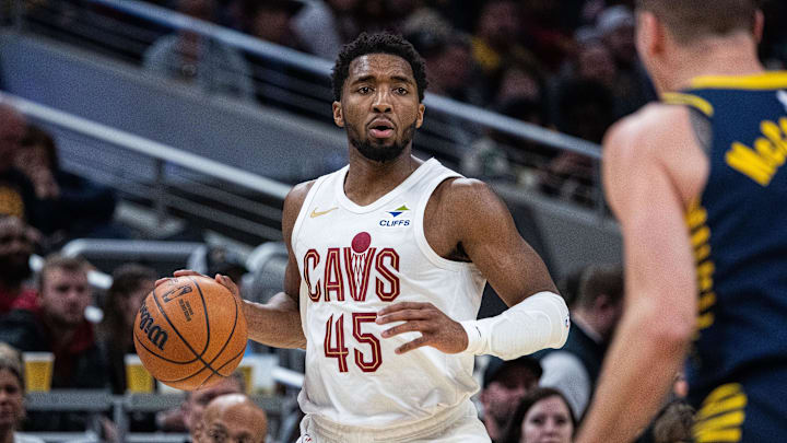 Jan 14, 2025; Indianapolis, Indiana, USA;  Cleveland Cavaliers guard Donovan Mitchell (45) dribble the ball in the first half against the Indiana Pacers  at Gainbridge Fieldhouse. Mandatory Credit: Trevor Ruszkowski-Imagn Images