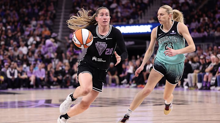 Golden State Valkyries guard Kate Martin (20) drives in against New York Liberty guard Marine Johannes (23) during the third quarter at Chase Center. 