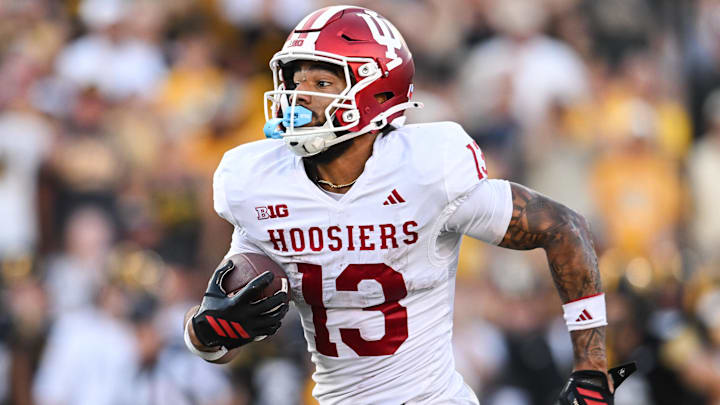 Indiana wide receiver Elijah Sarratt runs on a 49-yard touchdown reception Sept. 27, 2025, against Iowa at Kinnick Stadium.