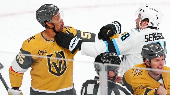 Apr 19, 2026; Las Vegas, Nevada, USA; Vegas Golden Knights right wing Keegan Kolesar (55) grabs the jersey of Utah Mammoth defenseman Mikhail Sergachev (98) at the end of game one of the first round of the 2026 Stanley Cup Playoffs at T-Mobile Arena. Mandatory Credit: Stephen R. Sylvanie-Imagn Images