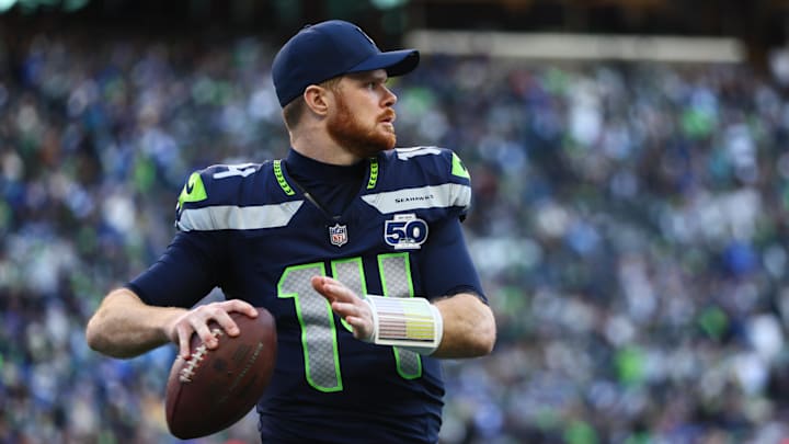 Seattle Seahawks quarterback Sam Darnold (14) passes against the Los Angeles Rams during the first half in the 2026 NFC Championship Game at Lumen Field. Seattle Seahawks quarterback Sam Darnold (14) passes against the Los Angeles Rams during the first half in the 2026 NFC Championship Game at Lumen Field.