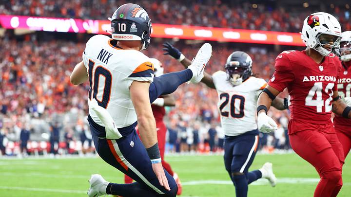 Oct 25, 2026; Glendale, Arizona, USA;  Bo Nix breaks the plane on his 62-yard rushing touchdown.