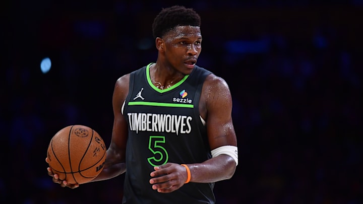 Apr 30, 2025; Los Angeles, California, USA; Minnesota Timberwolves guard Anthony Edwards (5) moves the ball against the Los Angeles Lakers during the second half in game five of first round for the 2025 NBA Playoffs at Crypto.com Arena. Mandatory Credit: Gary A. Vasquez-Imagn Images