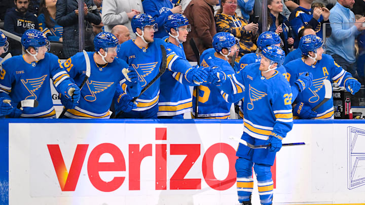 Mar 28, 2026; St. Louis, Missouri, USA; St. Louis Blues center Pius Suter (22) is congratulated by teammates after scoring a short handed goal against the Toronto Maple Leafs during the third period at Enterprise Center. Mandatory Credit: Jeff Curry-Imagn Images