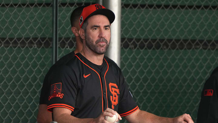 Feb 13, 2025; Scottsdale, AZ, USA; San Francisco Giants pitcher Justin Verlander (35) watches players work out in the bullpen during spring training camp. Feb 13, 2025; Scottsdale, AZ, USA; San Francisco Giants pitcher Justin Verlander (35) watches players work out in the bullpen during spring training camp.