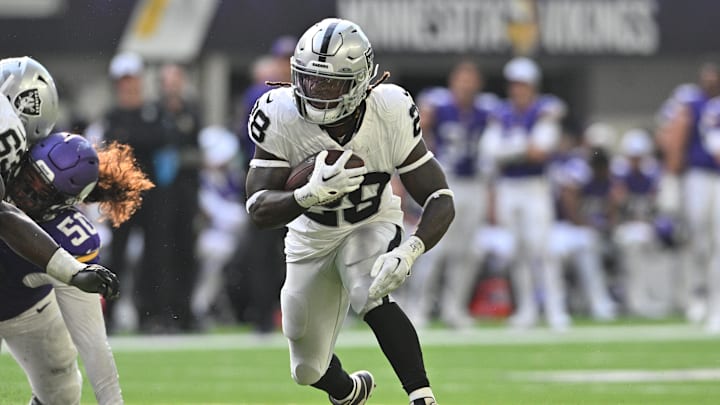 Aug 10, 2024; Minneapolis, Minnesota, USA; Las Vegas Raiders running back Sincere McCormick (28) runs the ball against the Minnesota Vikings during the third quarter at U.S. Bank Stadium. Mandatory Credit: Jeffrey Becker-Imagn Images Aug 10, 2024; Minneapolis, Minnesota, USA; Las Vegas Raiders running back Sincere McCormick (28) runs the ball against the Minnesota Vikings during the third quarter at U.S. Bank Stadium. Mandatory Credit: Jeffrey Becker-Imagn Images