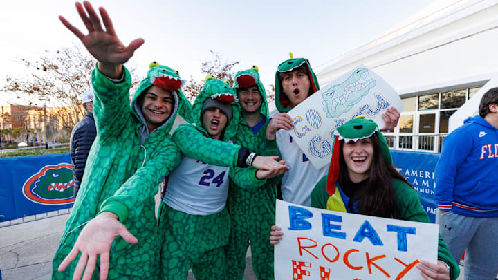 Jan 7, 2025; Gainesville, Florida, USA; Florida Gators students dressed in alligator costumes cheer outside before a game against the Tennessee Volunteers at Exactech Arena at the Stephen C. O'Connell Center. Mandatory Credit: Matt Pendleton-Imagn Images Jan 7, 2025; Gainesville, Florida, USA; Florida Gators students dressed in alligator costumes cheer outside before a game against the Tennessee Volunteers at Exactech Arena at the Stephen C. O'Connell Center. Mandatory Credit: Matt Pendleton-Imagn Images