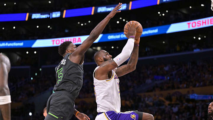 Los Angeles Lakers forward LeBron James is fouled by Minnesota Timberwolves guard Anthony Edwards as he goes up for a basket in the first half at Crypto.com Arena in Los Angeles on April 19, 2025. Los Angeles Lakers forward LeBron James is fouled by Minnesota Timberwolves guard Anthony Edwards as he goes up for a basket in the first half at Crypto.com Arena in Los Angeles on April 19, 2025.