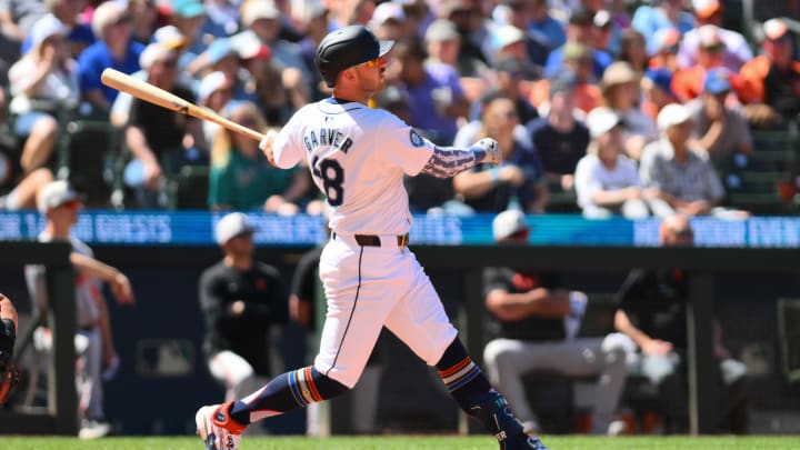 Seattle Mariners designated hitter Mitch Garver hits a home run against the Baltimore Orioles on July 4 at T-Mobile Park. Seattle Mariners designated hitter Mitch Garver hits a home run against the Baltimore Orioles on July 4 at T-Mobile Park.