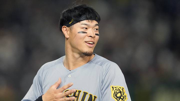 Mar 15, 2025; Bunkyo, Tokyo, Japan; Hanshin Tigers right fielder Teruaki Sato (8) during the fifth inning against the Chicago Cubs at Tokyo Dome. Mandatory Credit: Darren Yamashita-Imagn Images Mar 15, 2025; Bunkyo, Tokyo, Japan; Hanshin Tigers right fielder Teruaki Sato (8) during the fifth inning against the Chicago Cubs at Tokyo Dome. Mandatory Credit: Darren Yamashita-Imagn Images