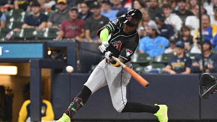 Sep 21, 2024; Milwaukee, Wisconsin, USA; Arizona Diamondbacks shortstop Geraldo Perdomo (2) grounds out against the Milwaukee Brewers in the fifth inning at American Family Field. Mandatory Credit: Michael McLoone-Imagn Images