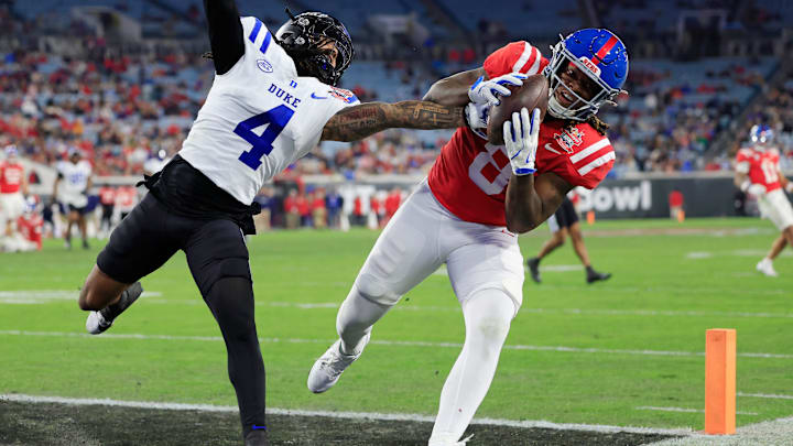 Mississippi Rebels tight end Dae'Quan Wright (8) hauls in a touchdown reception against Duke Blue Devils linebacker Cameron Bergeron (4) during the second quarter of the TaxSlayer Gator Bowl Thursday, Jan. 2, 2025 at EverBank Stadium in Jacksonville, Fla.