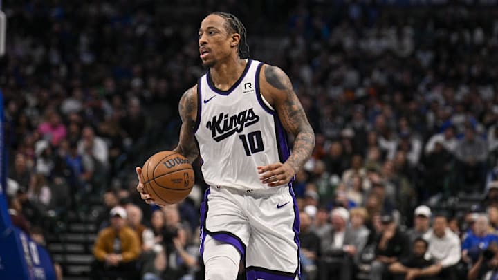 Feb 10, 2025; Dallas, Texas, USA; Sacramento Kings forward DeMar DeRozan (10) brings the ball up court against the Dallas Mavericks during the second half at the American Airlines Center. Mandatory Credit: Jerome Miron-Imagn Images