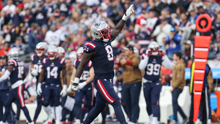 Nov 5, 2023; Foxborough, Massachusetts, USA; New England Patriots linebacker Ja'Whaun Bentley (8) celebrates after sacking Washington Commanders quarterback Sam Howell (14) during the second half at Gillette Stadium. Mandatory Credit: Paul Rutherford-Imagn Images
