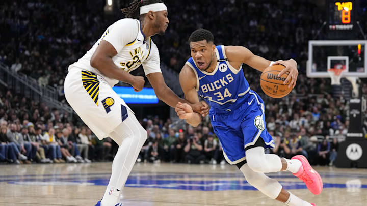 Mar 15, 2025; Milwaukee, Wisconsin, USA; Milwaukee Bucks forward Giannis Antetokounmpo (34) drives for the basket against Indiana Pacers center Myles Turner (33) during the fourth quarter at Fiserv Forum. Mandatory Credit: Jeff Hanisch-Imagn Images Mar 15, 2025; Milwaukee, Wisconsin, USA; Milwaukee Bucks forward Giannis Antetokounmpo (34) drives for the basket against Indiana Pacers center Myles Turner (33) during the fourth quarter at Fiserv Forum. Mandatory Credit: Jeff Hanisch-Imagn Images