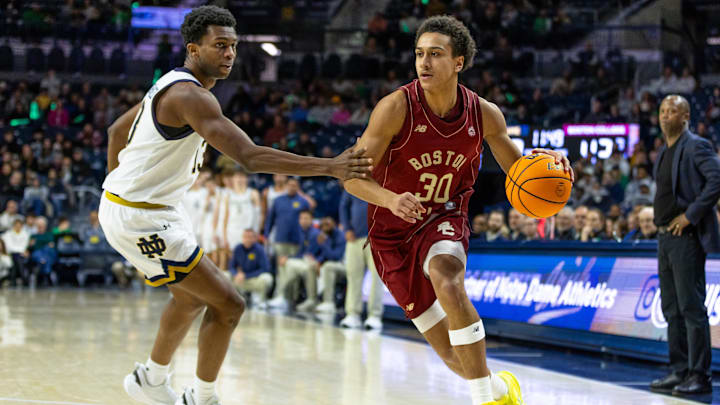 Jan 24, 2026; South Bend, Indiana, USA; Boston College Eagles guard Caleb Steger (30) drives against Notre Dame Fighting Irish guard Sir Mohammed (13) during the second half at Purcell Pavilion at the Joyce Center. Mandatory Credit: Michael Caterina-Imagn Images Jan 24, 2026; South Bend, Indiana, USA; Boston College Eagles guard Caleb Steger (30) drives against Notre Dame Fighting Irish guard Sir Mohammed (13) during the second half at Purcell Pavilion at the Joyce Center. Mandatory Credit: Michael Caterina-Imagn Images