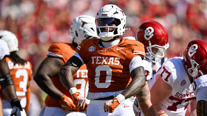 Texas Longhorns linebacker Anthony Hill Jr. (0) celebrates during the game between the Texas Longhorns and the Oklahoma Sooners at the Cotton Bowl. Texas Longhorns linebacker Anthony Hill Jr. (0) celebrates during the game between the Texas Longhorns and the Oklahoma Sooners at the Cotton Bowl.
